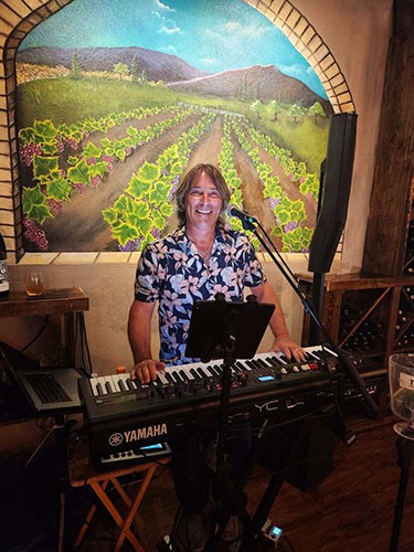 Musician Bill Fredericks performing live at UnWINEd Wine & Beer Bar in Punta Gorda